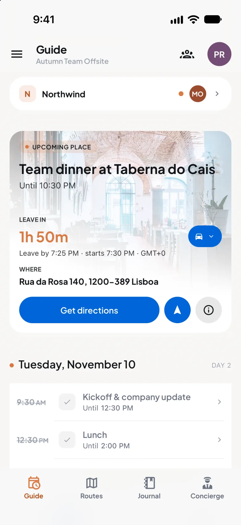 An attendee's Guide in Trip7 during the Lisbon offsite: the team dinner is up next, with 1 hour 50 minutes until they leave the hotel, its address and directions, and the day's sessions below.